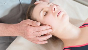 Male,Manual,Visceral,Therapist,Masseur,Treats,A,Young,Female,Patient.