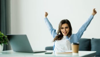 Young,Attractive,Woman,At,A,Modern,Office,Desk,,With,Laptop,