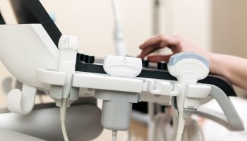 Skillful,Sonographer,Using,Ultrasound,Machine,At,Work